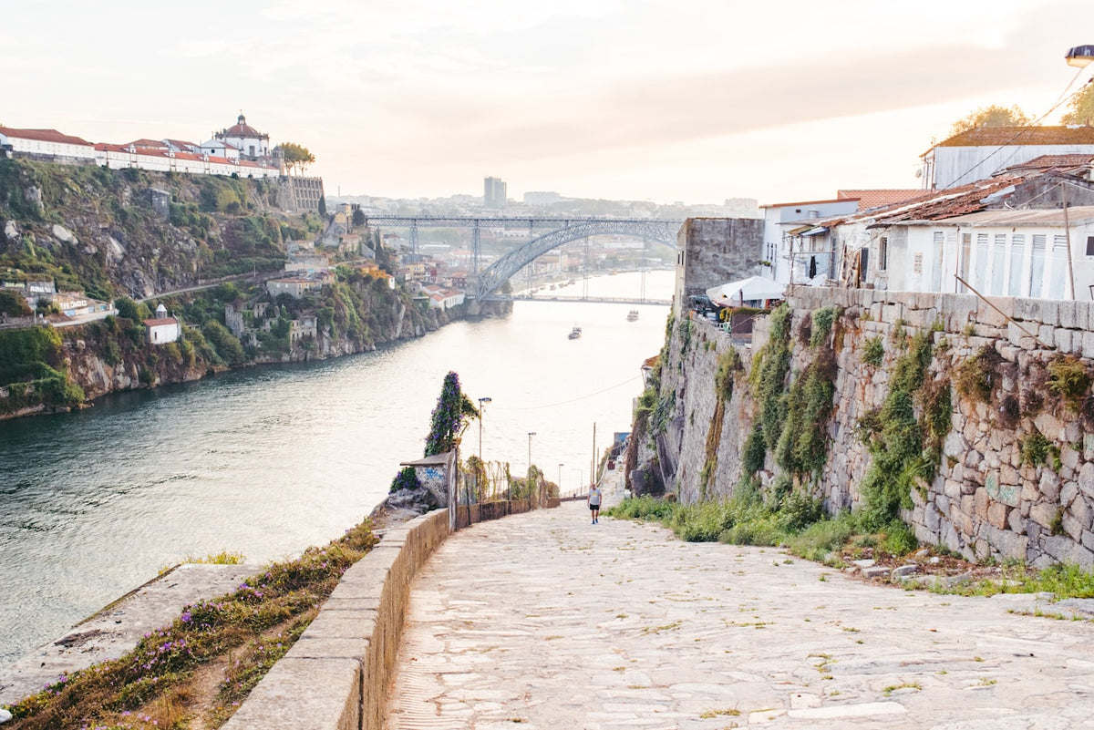 Porto and the Douro river with the city's colourful houses at golden hour